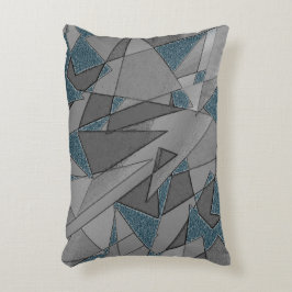 Graue Dreiecksausschnitte mit groben dunkelblauen  Dekokissen