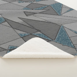 Graue Dreiecksausschnitte mit groben dunkelblauen  Sherpadecke