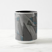 Graue Dreiecksausschnitte mit groben dunkelblauen  Tasse (Zentrum)