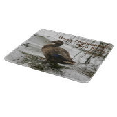 Graue Ente im Dunkeln des Sees Schneidebrett (Ecke)