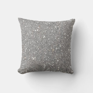 Graue, gesprenkelte Kissen