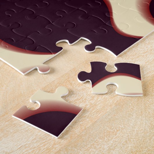 Graue, kugelförmige Formen, braune Farbmuster. Puzzle (Seite)