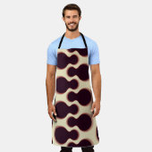 Graue, kugelförmige Formen, braune Farbmuster. Schürze (Getragen)