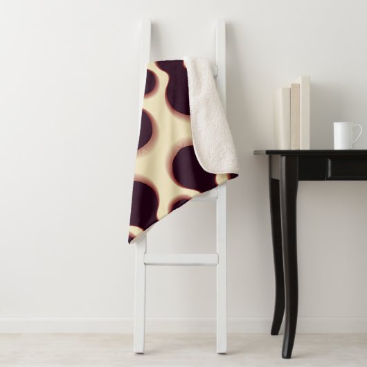 Graue, kugelförmige Formen, braune Farbmuster. Sherpadecke (Beispiel)