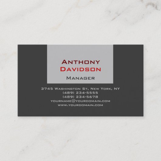 Graue rote Visitenkarte für den Manager (Vorderseite)