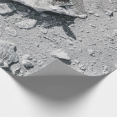 Graue Steine auf grauem Schmutz Geschenkpapier (Ecke)