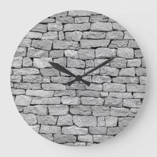 Graue Steinmauer, abstrakter Hintergrund. Große Wanduhr