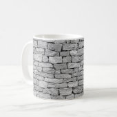 Graue Steinmauer, abstrakter Hintergrund. Kaffeetasse (Vorderseite Links)