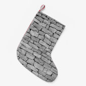 Graue Steinmauer, abstrakter Hintergrund. Kleiner Weihnachtsstrumpf (Vorderansicht (hängend))