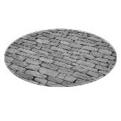 Graue Steinmauer, abstrakter Hintergrund. Schneidebrett (Ecke)