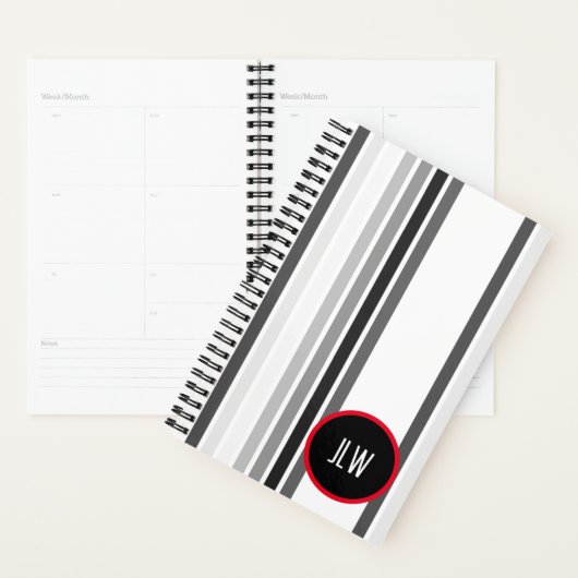 Graue Streifen roter Kreis Schwarz-weiß mit Initia Planer (Anzeige)