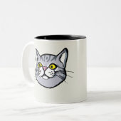 Graue Tabby-Katze, die Tasse zeichnet (Vorderseite Links)