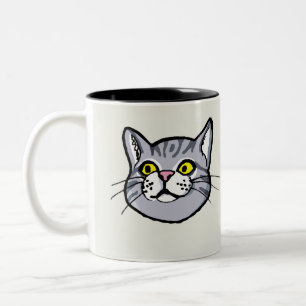 Graue Tabby-Katze, die Tasse zeichnet