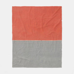 Graue und orangefarbene Wand Fleecedecke