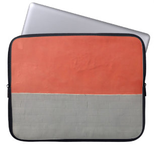 Graue und orangefarbene Wand Laptopschutzhülle