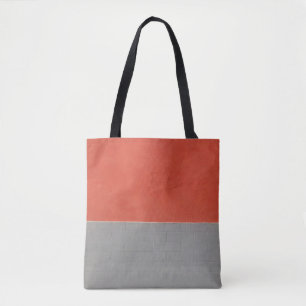 Graue und orangefarbene Wand Tasche