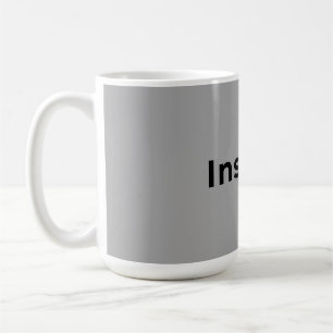 Graue und weiße Tasse