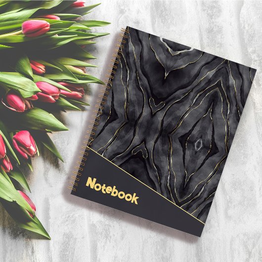 Graues, goldfarbenes Notebook Notizblock