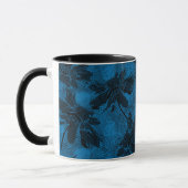 Graues und blaues Blumenmuster. Tasse (Links)