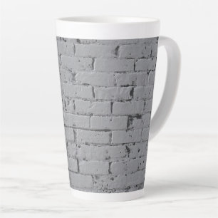 Graufarbene Ziegelmauer Milchtasse