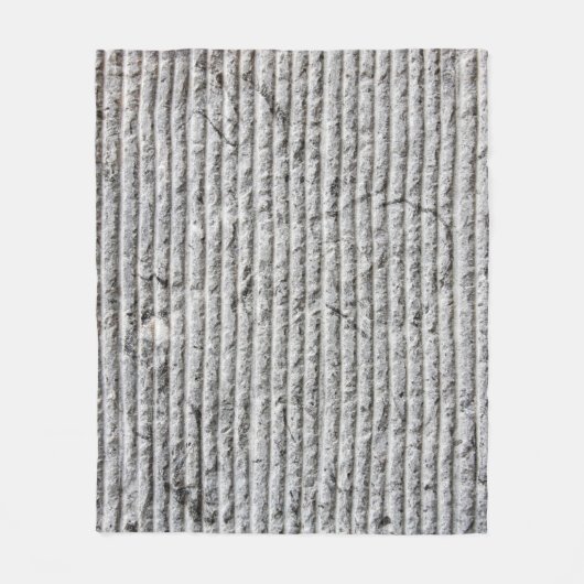 Grausteinfarbene Wandstruktur. Textur der Steinmau Fleecedecke (Vorderseite)