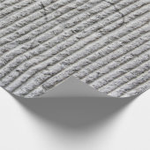 Grausteinfarbene Wandstruktur. Textur der Steinmau Geschenkpapier (Ecke)