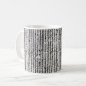 Grausteinfarbene Wandstruktur. Textur der Steinmau Kaffeetasse (Vorderseite Links)