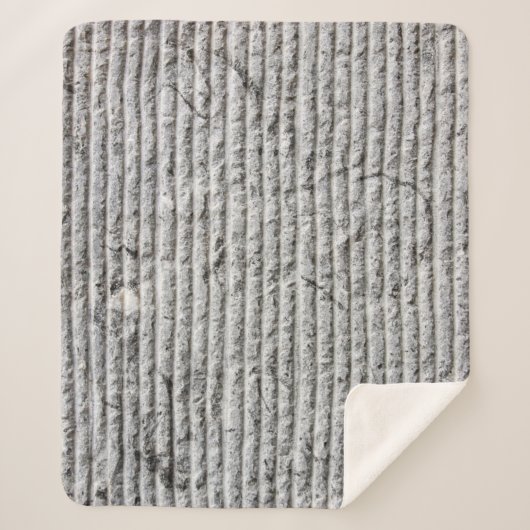 Grausteinfarbene Wandstruktur. Textur der Steinmau Sherpadecke (Vorderseite)