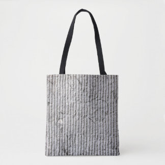 Grausteinfarbene Wandstruktur. Textur der Steinmau Tasche