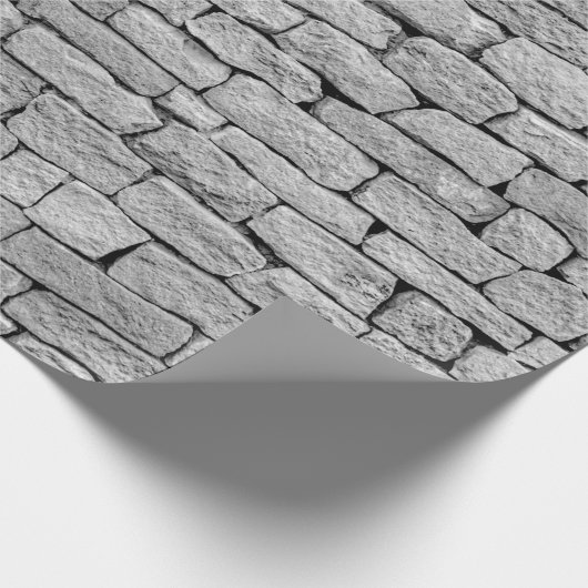 Grausteinmauer als abstrakter Hintergrund. Geschenkpapier (Ecke)