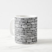 Grausteinmauer als abstrakter Hintergrund. Kaffeetasse (Vorderseite Links)