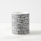 Grausteinmauer als abstrakter Hintergrund. Kaffeetasse (Mittel)