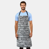 Grausteinmauer als abstrakter Hintergrund. Schürze (Getragen)