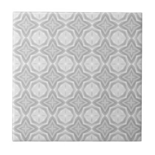 Grauweiße geometrische Keramik Fliese