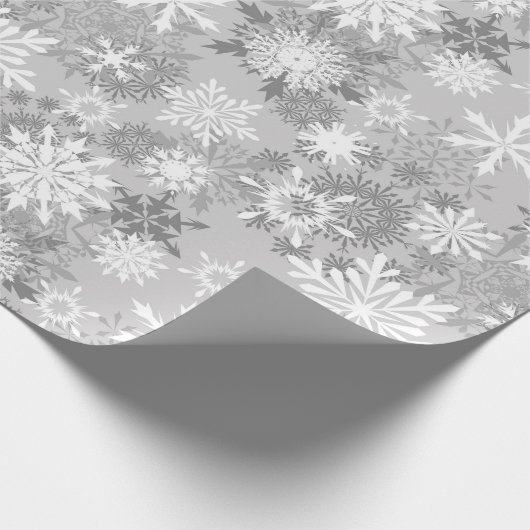 Grauweißes Schneeflockenpapier Geschenkpapier (Ecke)