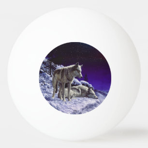 Grauwölfe im Winterschnee in der Nacht Tischtennisball