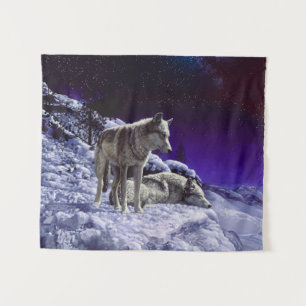 Grauwölfe im Winterschnee in der Nacht Wandteppich