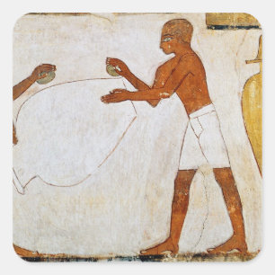 Gravieren und Polieren von Vasen in Gold und Quadratischer Aufkleber