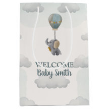 Gray Baby Elephant, Hot Air Ballon in Wolken