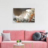 Gray Feather in Snowy Evergreen Branch Leinwanddruck (Insitu (Wohnzimmer))