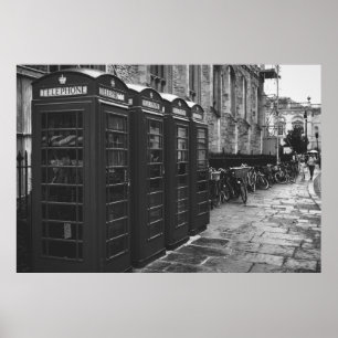 GRAYSCALE PHOTO OF FOUR TELEPHONE BOOTHS LINED UP POSTER