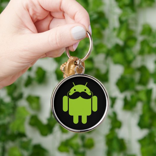 Green Android Robot Mustache auf Black Schlüsselanhänger (Hand)