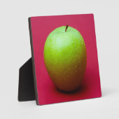 Green apple on red background fotoplatte (Vorderseite)