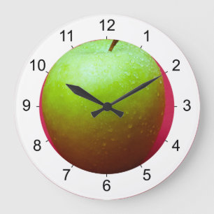 Green apple on red background große wanduhr