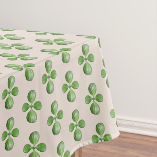 Green Jade Tree Blätter auf hellbeige Tischdecke (Beispiel)