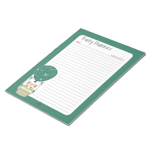 Green Kitty in einem Ballon Planner Notepad Notizblock (angewinkelt)