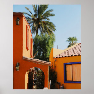 Green palm tree beside brown concrete building in poster