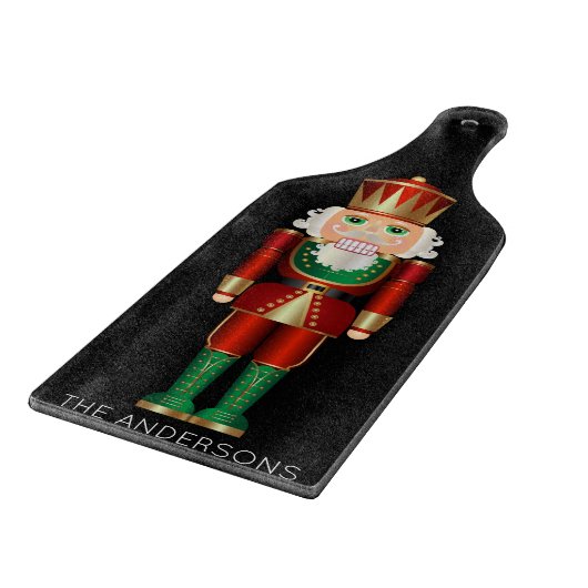 Green und Gold Nutcracker auf der Black Cutting Bo Schneidebrett (Ecke)