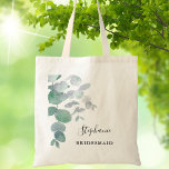 Greenery Eucalyptus Bridesmaid Tragetasche<br><div class="desc">Diese elegante Bridesmaid Tote Bag ist mit Aquarell Eukalyptus-Blätter in sanften Grüntönen dekoriert. Einfach anpassbar. Verwenden Sie zum Bearbeiten das Entwurfstool, um den Schriftart, die Größe des Schriftartes oder die Farbe zu ändern. Weil wir unsere Kunstwerke erstellen, werden Sie dieses exakte Bild von anderen Designern nicht finden. Original Wasserfarbe ©...</div>