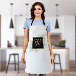 Greenery Watercolor Blätter Black Gold Monogram Schürze<br><div class="desc">Elegante Aquarellfarben verlasse florale Monogramm-Namen-Schürze mit einem goldenen Monogramm-Initial auf schwarzem Hintergrund mit Ihrem Namen Set stilvolle weiße Schrift. Entwickelt von Thisisnotme©</div>